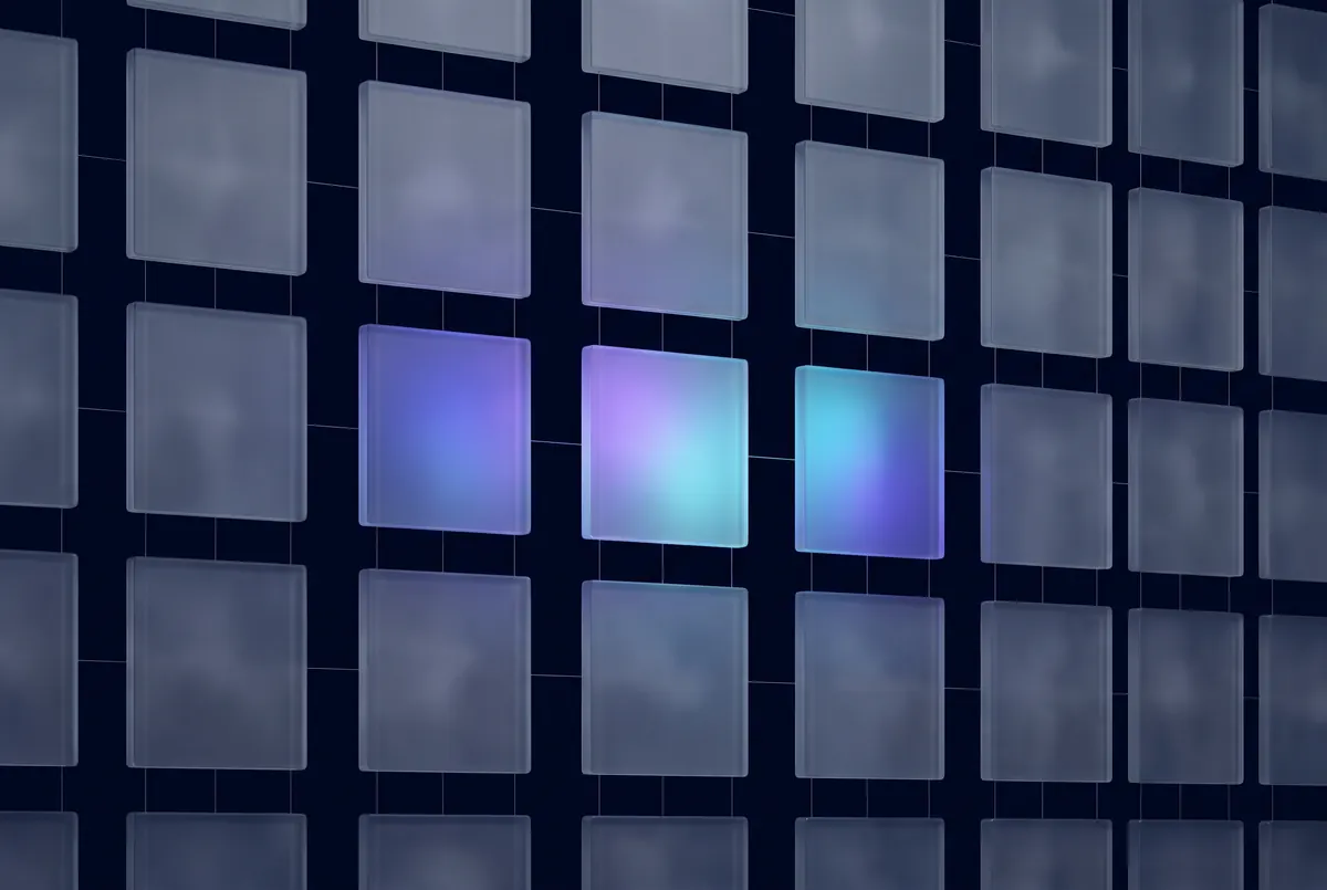 A grid of frosted glass tiles with three lit from within